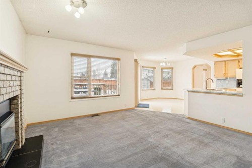 2498 Catalina Boulevard Ne, Calgary, AB - Indoor With Fireplace