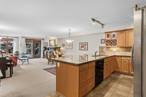 112-150 Crosbow Place, Canmore, AB - Indoor Photo Showing Other Room