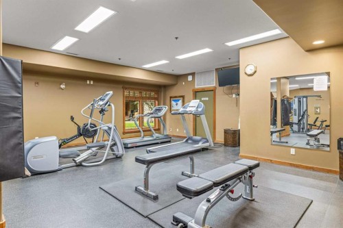 112-150 Crosbow Place, Canmore, AB - Indoor Photo Showing Gym Room