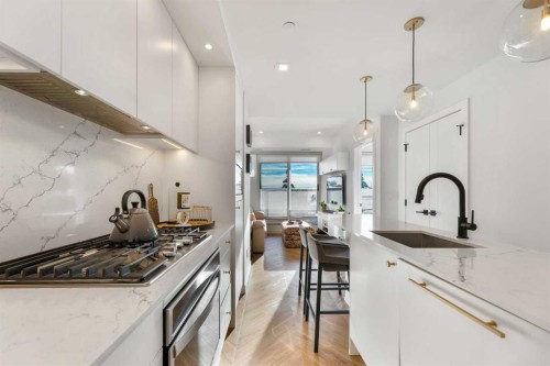 212-8505 Broadcast Avenue Sw, Calgary, AB - Indoor Photo Showing Kitchen With Upgraded Kitchen