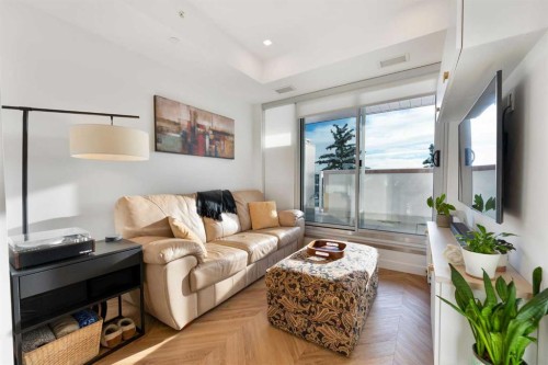 212-8505 Broadcast Avenue Sw, Calgary, AB - Indoor Photo Showing Living Room