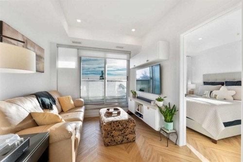 212-8505 Broadcast Avenue Sw, Calgary, AB - Indoor Photo Showing Living Room