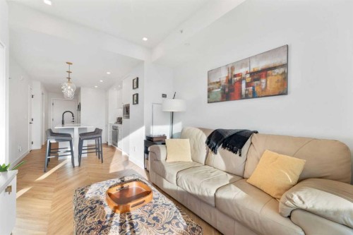 212-8505 Broadcast Avenue Sw, Calgary, AB - Indoor Photo Showing Living Room