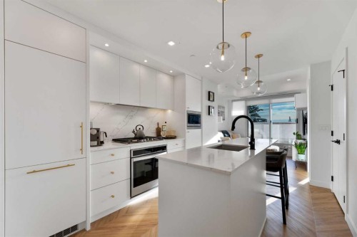 212-8505 Broadcast Avenue Sw, Calgary, AB - Indoor Photo Showing Kitchen With Upgraded Kitchen