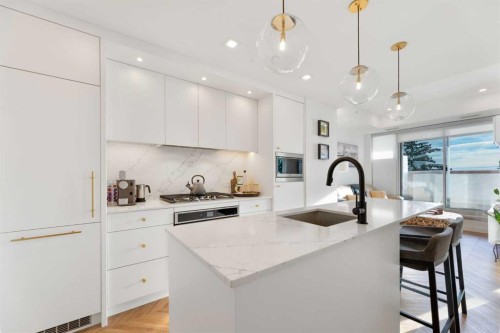 212-8505 Broadcast Avenue Sw, Calgary, AB - Indoor Photo Showing Kitchen With Upgraded Kitchen