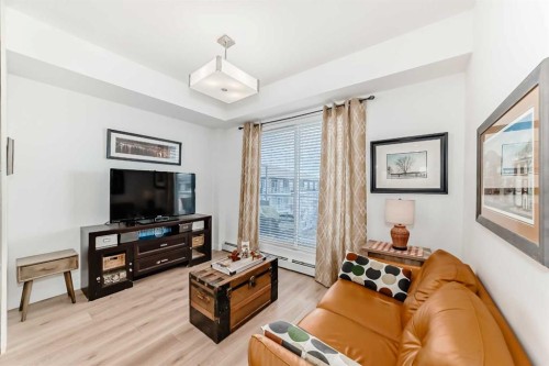 1406-76 Cornerstone Passage Ne, Calgary, AB - Indoor Photo Showing Living Room