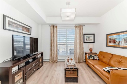 1406-76 Cornerstone Passage Ne, Calgary, AB - Indoor Photo Showing Living Room