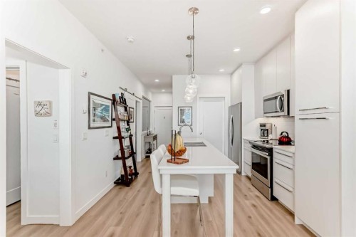 1406-76 Cornerstone Passage Ne, Calgary, AB - Indoor Photo Showing Kitchen With Upgraded Kitchen
