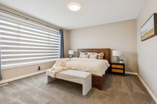 487 Rivercrest Road, Cochrane, AB - Indoor Photo Showing Bedroom