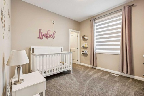 487 Rivercrest Road, Cochrane, AB - Indoor Photo Showing Bedroom