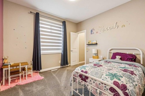 487 Rivercrest Road, Cochrane, AB - Indoor Photo Showing Bedroom