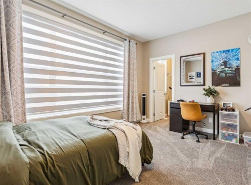 487 Rivercrest Road, Cochrane, AB - Indoor Photo Showing Bedroom