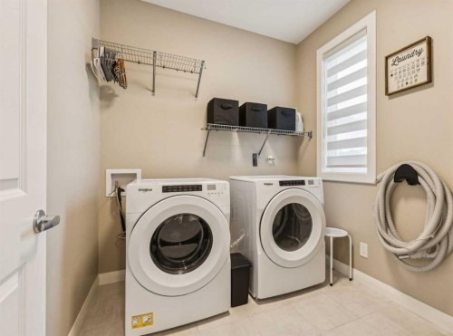 487 Rivercrest Road, Cochrane, AB - Indoor Photo Showing Laundry Room