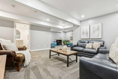 487 Rivercrest Road, Cochrane, AB - Indoor Photo Showing Living Room