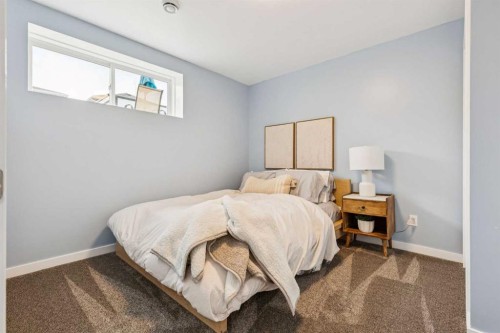 487 Rivercrest Road, Cochrane, AB - Indoor Photo Showing Bedroom
