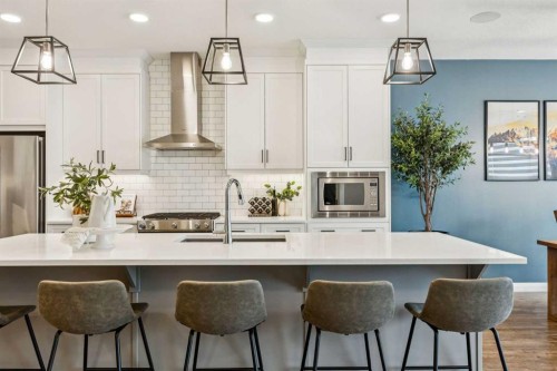 487 Rivercrest Road, Cochrane, AB - Indoor Photo Showing Kitchen With Upgraded Kitchen
