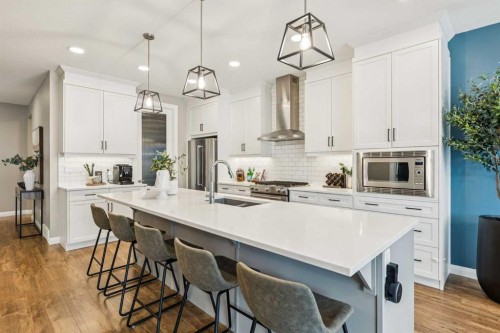 487 Rivercrest Road, Cochrane, AB - Indoor Photo Showing Kitchen With Upgraded Kitchen