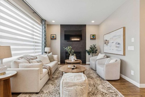 487 Rivercrest Road, Cochrane, AB - Indoor Photo Showing Living Room With Fireplace