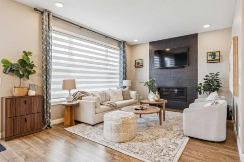 487 Rivercrest Road, Cochrane, AB - Indoor Photo Showing Living Room With Fireplace