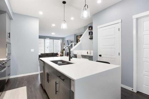 265 Belmont Way Sw, Calgary, AB - Indoor Photo Showing Kitchen With Double Sink