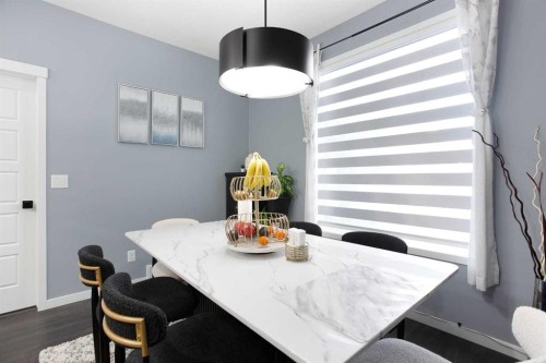265 Belmont Way Sw, Calgary, AB - Indoor Photo Showing Dining Room