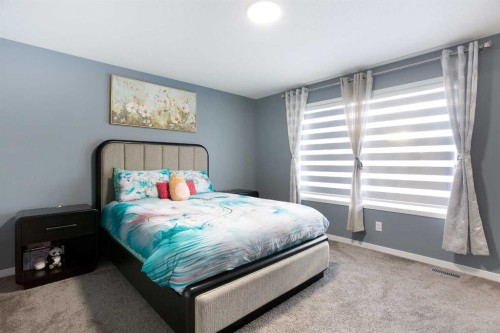 265 Belmont Way Sw, Calgary, AB - Indoor Photo Showing Bedroom