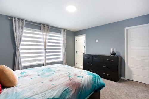 265 Belmont Way Sw, Calgary, AB - Indoor Photo Showing Bedroom
