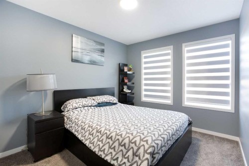 265 Belmont Way Sw, Calgary, AB - Indoor Photo Showing Bedroom