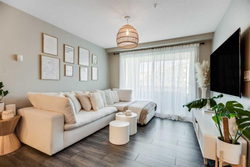 221-110 Auburn Meadows View Se, Calgary, AB - Indoor Photo Showing Living Room