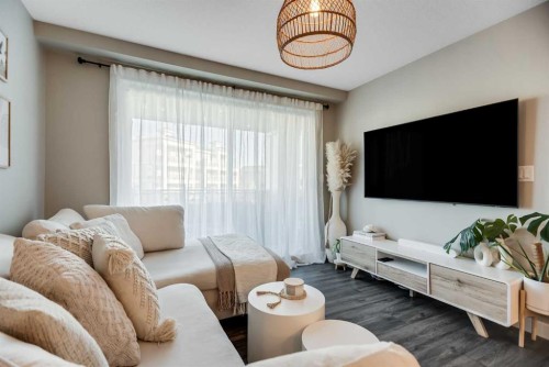 221-110 Auburn Meadows View Se, Calgary, AB - Indoor Photo Showing Living Room
