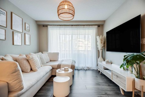 221-110 Auburn Meadows View Se, Calgary, AB - Indoor Photo Showing Living Room