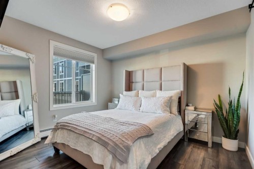 221-110 Auburn Meadows View Se, Calgary, AB - Indoor Photo Showing Bedroom
