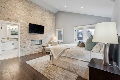 419 47 Avenue Sw, Calgary, AB - Indoor Photo Showing Bedroom With Fireplace