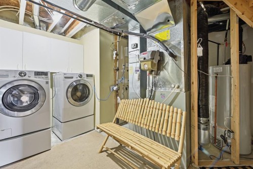 124 Evansbrooke Landing Nw, Calgary, AB - Indoor Photo Showing Laundry Room