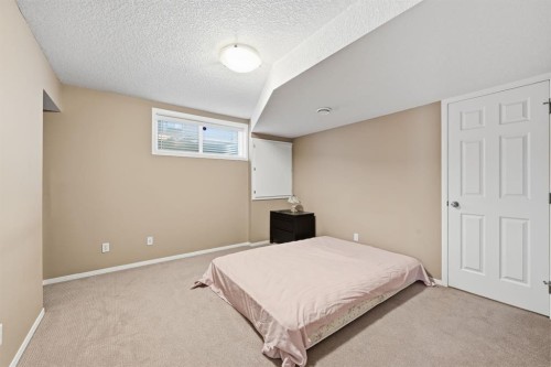 124 Evansbrooke Landing Nw, Calgary, AB - Indoor Photo Showing Bedroom