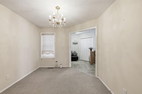 124 Evansbrooke Landing Nw, Calgary, AB - Indoor Photo Showing Other Room