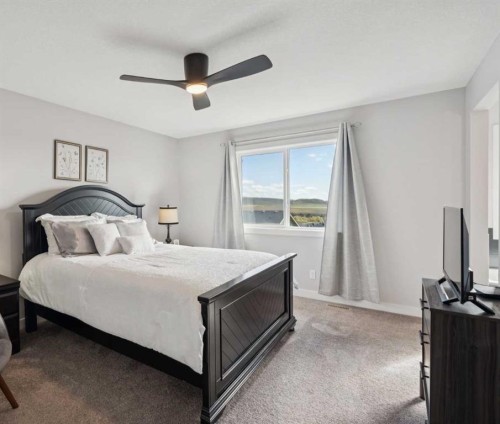 363 Precedence Hill, Cochrane, AB - Indoor Photo Showing Bedroom