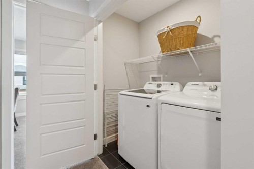363 Precedence Hill, Cochrane, AB - Indoor Photo Showing Laundry Room