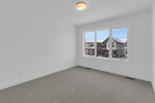 1321 South Point Parade Sw, Airdrie, AB - Indoor Photo Showing Other Room