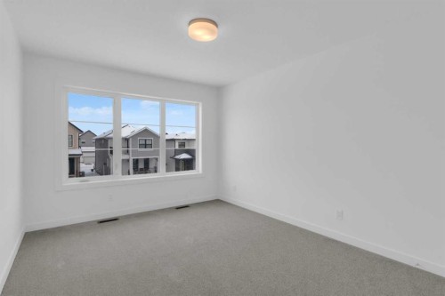 1321 South Point Parade Sw, Airdrie, AB - Indoor Photo Showing Other Room