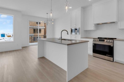 1321 South Point Parade Sw, Airdrie, AB - Indoor Photo Showing Kitchen With Upgraded Kitchen