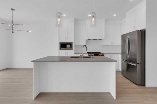 1321 South Point Parade Sw, Airdrie, AB - Indoor Photo Showing Kitchen With Upgraded Kitchen