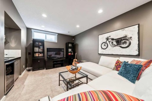 78 Ypres Green Sw, Calgary, AB - Indoor With Fireplace
