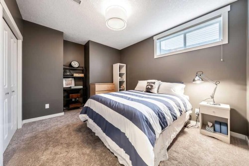 78 Ypres Green Sw, Calgary, AB - Indoor Photo Showing Bedroom