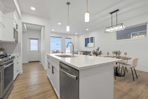 175 Creekstone Way Sw, Calgary, AB - Indoor Photo Showing Kitchen With Upgraded Kitchen