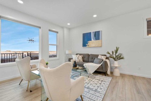 175 Creekstone Way Sw, Calgary, AB - Indoor Photo Showing Living Room