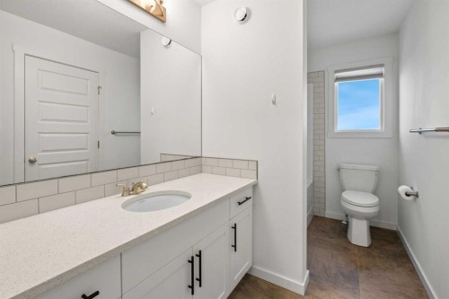 175 Creekstone Way Sw, Calgary, AB - Indoor Photo Showing Bathroom