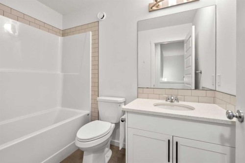 175 Creekstone Way Sw, Calgary, AB - Indoor Photo Showing Bathroom