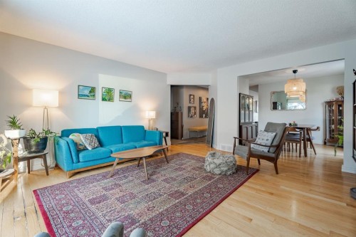 84 Thornaby Crescent Nw, Calgary, AB - Indoor Photo Showing Living Room