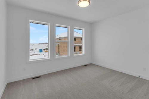 1325 South Point Parade Sw, Airdrie, AB - Indoor Photo Showing Other Room
